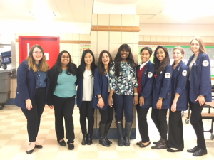 Clarisssa Burroughs (center) with Community Outreach Team Photo