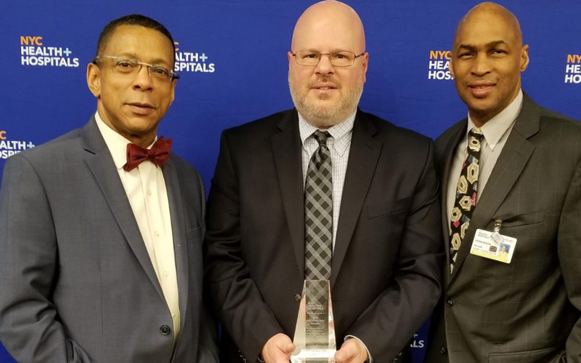 (L-R) Dr. David John, East New York chief medical officer, Dr. Lloyd Haskes and William Perkinson, East New York associate executive director during NYC Health + Hospitals' Doctors' Day Celebration at Baruch College, April 30, 2019.