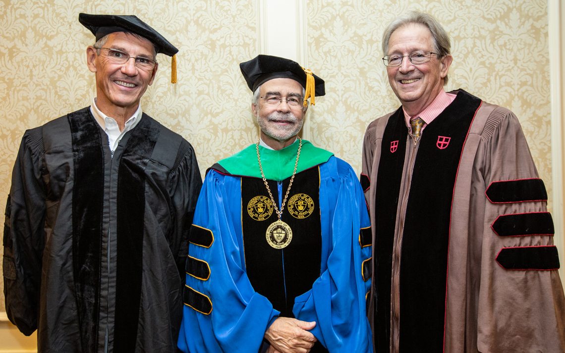 Essilor chairman Hubert Sagnières, SUNY Optometry president David A. Heath and Columbia University professor Dr. Donald Hood during the College's 45th commencement, The Roosevelt Hotel, Manhattan, May 23, 2019