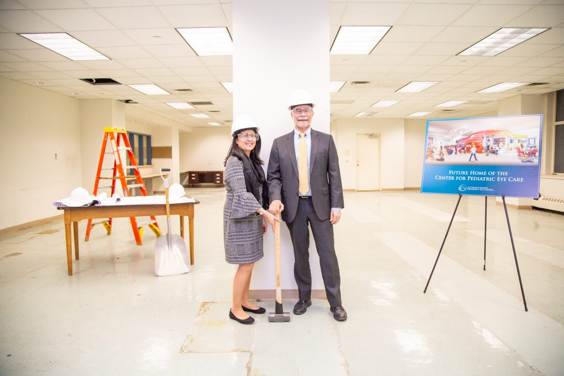 SUNY Optometry vice president for clinical administration Liduvina Martinez-Gonzalez and president David A. Heath lead groundbreaking ceremony for the new Center for Pediatric Eye Care, August 18, 2019.